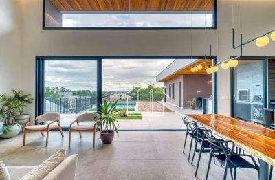 Casa com 4 dormitórios à venda, 422 m² por r$ 5.180.000,00 - condomínio reserva do paratehy - são josé dos campos/sp