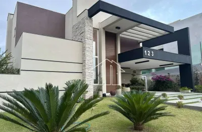 Casa com 4 dormitórios à venda, 256 m² por r$ 3.800.000,00 - condomínio residencial alphaville - são josé dos campos/sp