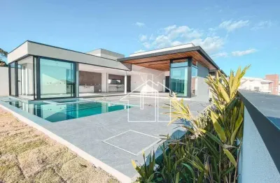 Casa com 4 dormitórios à venda, 600 m² por r$ 6.450.000,00 - condomínio reserva do paratehy - são josé dos campos/sp