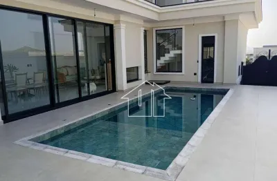 Casa com 4 dormitórios à venda, 450 m² por r$ 4.500.000,00 - condomínio reserva do paratehy - são josé dos campos/sp