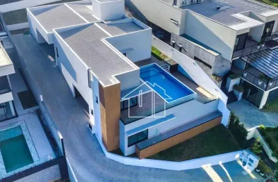 Casa com 5 dormitórios à venda, 370 m² por r$ 5.400.000,00 - condomínio reserva do paratehy - são josé dos campos/sp