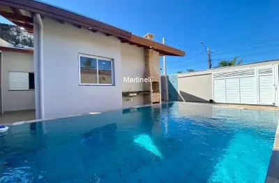 Casa à venda em itanhaém-sp, belas artes: 2 quartos, 2 suítes, 1 sala, 3 banheiros, 2 vagas e 73m². confira já!