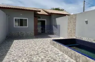 Imperdível oportunidade de adquirir uma casa de 2 quartos no jardim guacyra, itanhaém-sp, com 2 vagas de garagem!