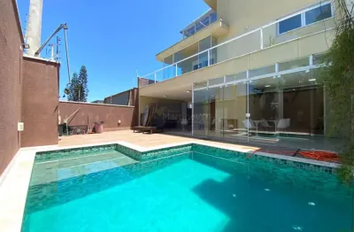 Casa à venda em itanhaém-sp, na praia do sonho: 4 quartos, 3 suítes, 3 salas, 5 banheiros, 4 vagas de garagem, 284m² de área.