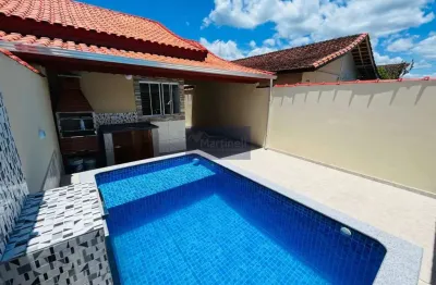 Imperdível casa à venda em itanhaém-sp, bairro loty: 2 quartos, 1 suíte, 1 sala, 2 banheiros, 2 vagas de garagem, 57,43 m²