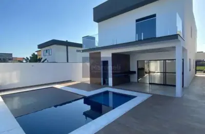 Casa em condomínio à venda em itanhaém-sp, bairro guacira: 3 quartos, 2 suítes, 1 sala, 5 banheiros, 4 vagas de garagem, 162m².