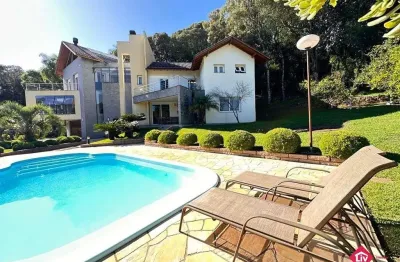 Casa em condominio para venda - 583m², 4 dormitórios, sendo 3 suites, 4 vagas - linha 40