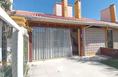 Sobrado geminado 2 dorm à venda no bairro capão novo - 2 vagas de garagem
