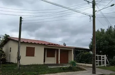 Casa 02 dorm à venda no bairro capão novo - 2 vagas de garagem