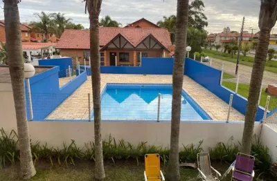 Sobrado 2 dorm e meio à venda no bairro capão novo com 79 m² de área privativa - 1 vaga de garagem