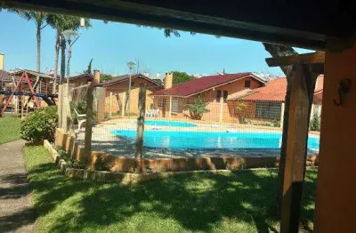 Sobrado 02 dorm à venda no bairro capão novo com 70 m² de área privativa - 2 vagas de garagem