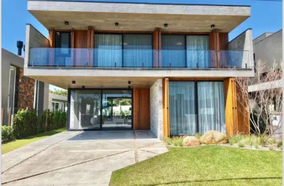 Casa 05 dorm à venda no bairro capão novo com 420 m² de área privativa - 2 vagas de garagem