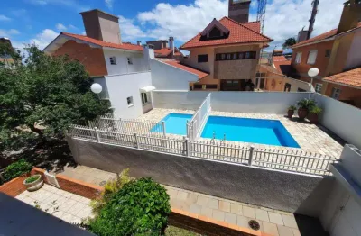 Sobrado 03 dorm à venda no bairro capão novo com 95 m² de área privativa - 2 vagas de garagem