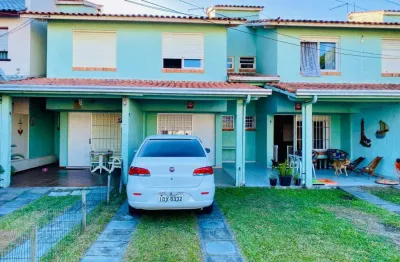 Sobrado 02 dorm à venda no bairro capão novo com 75 m² de área privativa - 1 vaga de garagem