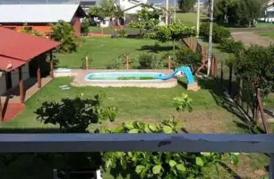 Sobrado 02 dorm à venda no bairro arroio do sal - 1 vaga de garagem