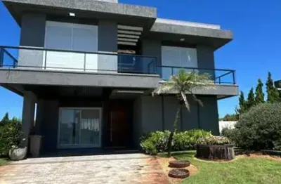 Casa 04 dorm à venda no bairro capão novo com 300 m² de área privativa - 2 vagas de garagem
