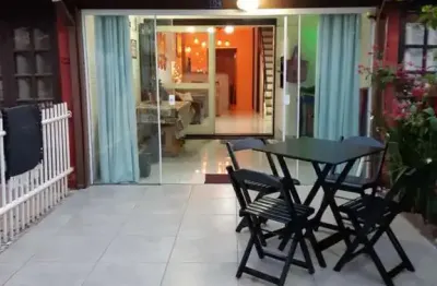 Sobrado 02 dorm à venda no bairro capão novo com 75 m² de área privativa - 2 vagas de garagem