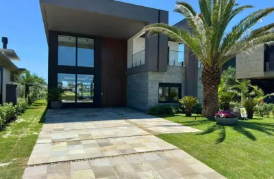 Casa 04 dorm à venda no bairro capão novo com 344 m² de área privativa - 2 vagas de garagem