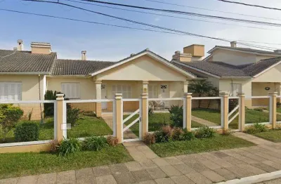 Sobrado 02 dorm à venda no bairro capão novo - 1 vaga de garagem