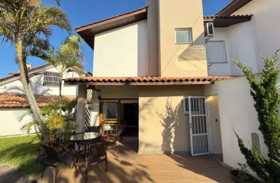 Sobrado 02 dorm à venda no bairro capão novo com 75 m² de área privativa - 2 vagas de garagem