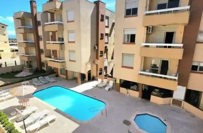 Apartamento 02 dorm à venda no bairro capão novo - 1 vaga de garagem