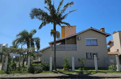 Sobrado 03 dorm à venda no bairro capão novo com 140 m² de área privativa - 1 vaga de garagem