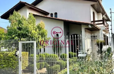 Casa com 4 quartos à venda na joão polla, 515, rio branco, caxias do sul por r$ 1.050.000