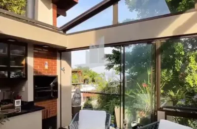 Casa em condomínio fechado com 3 quartos à venda na rua doutor possidônio cunha, 265, vila assunção, porto alegre por r$ 1.200.000