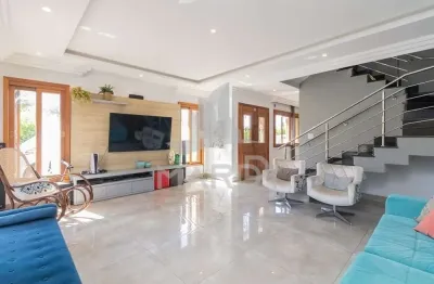 Casa em condomínio fechado com 3 quartos à venda na rua deputado hugo mardini, 1780, passo das pedras, porto alegre por r$ 1.550.000