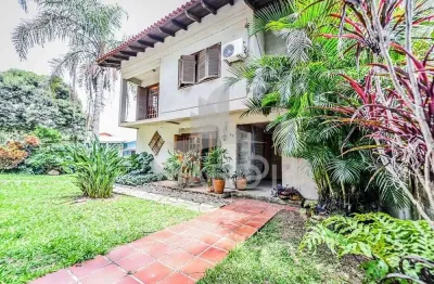 Casa em condomínio fechado com 4 quartos à venda na acesso das orquídeas, 93, santa tereza, porto alegre por r$ 520.000