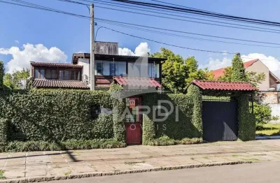 Casa com 3 quartos à venda na avenida guarujá, 140, guarujá, porto alegre por r$ 749.000