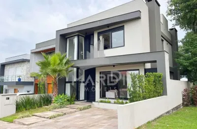 Casa em condomínio fechado com 4 quartos à venda na rua francisco solano borges, 200, hípica, porto alegre por r$ 1.285.000