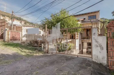 Casa com 5 quartos à venda na rua patrimonio, 119, glória, porto alegre por r$ 731.000