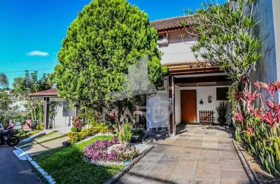 Casa em condomínio fechado com 3 quartos à venda na avenida eduardo prado, 695, cavalhada, porto alegre por r$ 690.000
