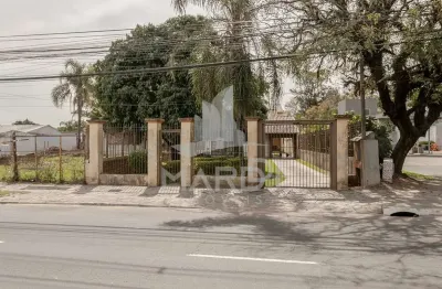 Casa com 4 quartos à venda na avenida juca batista, 1190, cavalhada, porto alegre por r$ 1.076.000