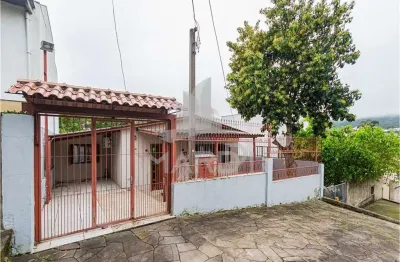Casa com 3 quartos à venda na cunha neto, 334, nonoai, porto alegre por r$ 380.000