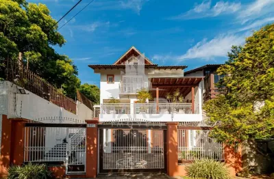 Casa com 4 quartos à venda na avenida general barreto viana, 595, chácara das pedras, porto alegre por r$ 2.399.000