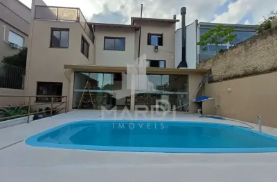 Casa com 3 quartos à venda na Rua Professor Abílio Azambuja, 43, Jardim do Salso, Porto Alegre por R$ 1.299.000