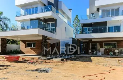 Casa em condomínio fechado com 3 quartos à venda na avenida coronel marcos, 1239, pedra redonda, porto alegre por r$ 2.390.000
