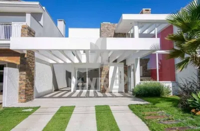 Casa em condomínio fechado com 5 quartos à venda na avenida juca batista, 8000, belém novo, porto alegre por r$ 1.650.000
