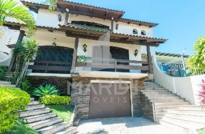Casa com 5 quartos à venda na rua afonso álvares, 49, tristeza, porto alegre por r$ 2.700.000