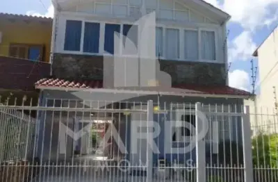 Casa com 3 quartos à venda na rua carlos scliar, 99, hípica, porto alegre por r$ 750.000