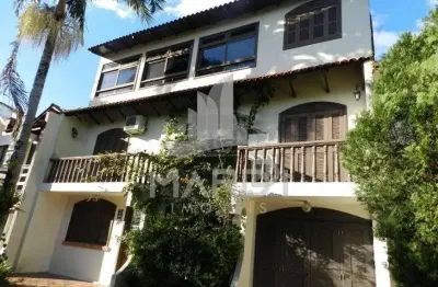 Casa em condomínio fechado com 5 quartos à venda na avenida otto niemeyer, 1199, tristeza, porto alegre por r$ 595.000