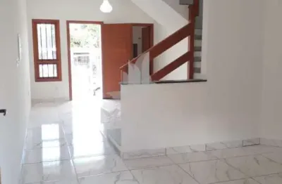 Casa com 2 quartos à venda na rua helio felix frey, 130, guarujá, porto alegre por r$ 360.000