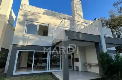 Casa em condomínio fechado com 3 quartos à venda na rua doutor ney de castilhos ferreira, 300, pedra redonda, porto alegre por r$ 3.150.000