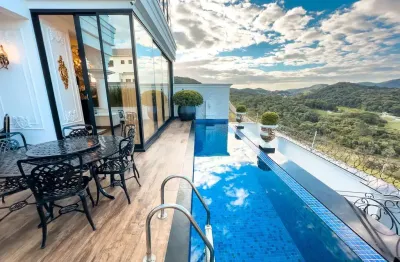 Magnífica mansão de alto padrão à venda em condomínio fechado em camboriú/sc