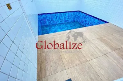 Casa sobreposta com 4 quartos,sendo 2 suítes,5 banheiros,2,vagas no bairro do campo grande em santos por r$1.550.000,00