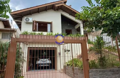 Vende casa semimobiliada, 03 dormitórios, 01 sendo suíte, 03 vagas, bairro santa lúcia.