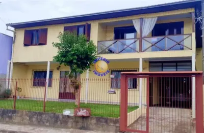 Império imóveis, vende casa mista com 03 moradias, localizada no bai