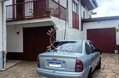 Casa com 02 moradias - 05 dormitórios - arco baleno.